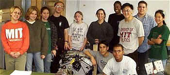 1st_session_students_around_engine.jpg (23021 bytes)