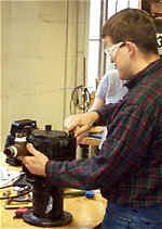 student_working_on_internal_gear_pump.jpg (11217 bytes)