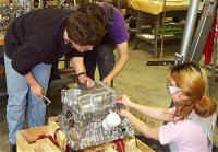 students_working_on_6_cylinder_block.jpg (11361 bytes)