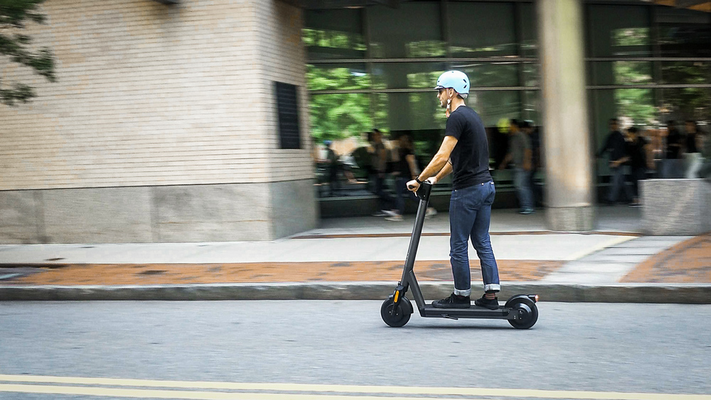 A person riding Superpedestrian’s e-scooter