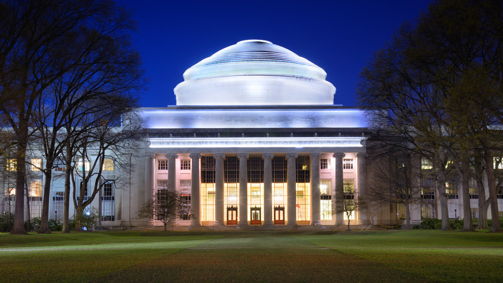 The great dome at MIT lit up at dusk