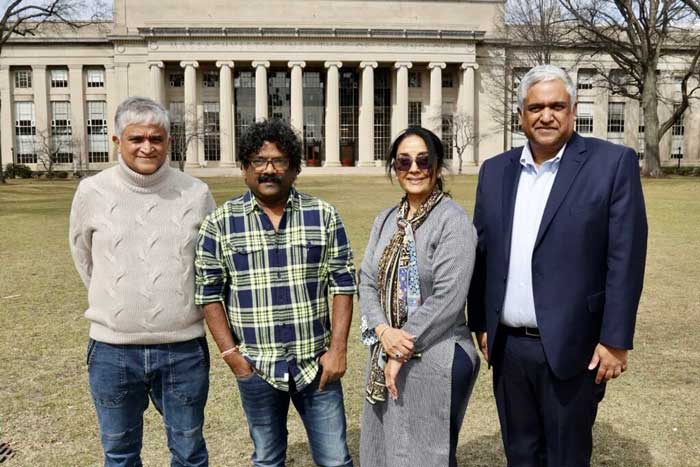 Prashanth Palakurthi, Chandrabose, Anuradha Palakurthi, with Dean Anantha Chandrakasan in Killian Court in front of the Great Dome