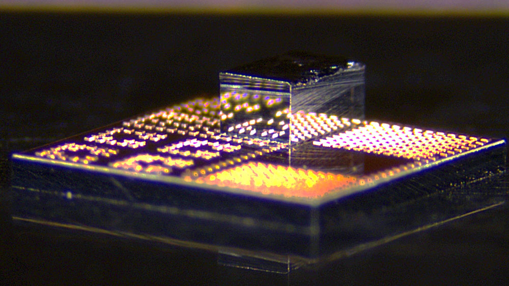 new computer chip with tiny metallic box on top