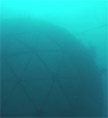 Silhouetted underwater image of the new self-propelled cage.