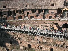 The Tourist Mob crosses the Colosseum