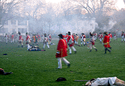 The officers are trying to regain control of their men, while the drums call them back.  The shooting is mostly over.