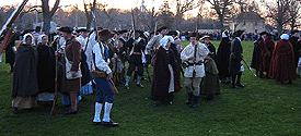 Another shot of citizens returning.  Captain Parker did reform his men after the British had passed, since they would be passing this way on their return to Boston.