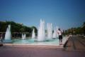 By a fountain in the same garden. Aaron is imitating the pose of the kitten on his shirt., 600x400, 30 Kb