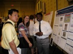 Chinweike with Andrew Ouon and Christy Schultz