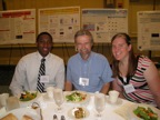 Prof. Graham Walker and his summer students at the poster presentation
