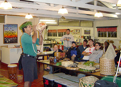 Nelson plays the conch