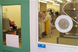 worker_in_mems_lab.jpg (11381 bytes)