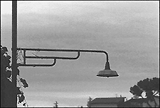 street lamp and diagram that shows the magnitude of a couple is the product of distance between the forces and the magnitude of the forces