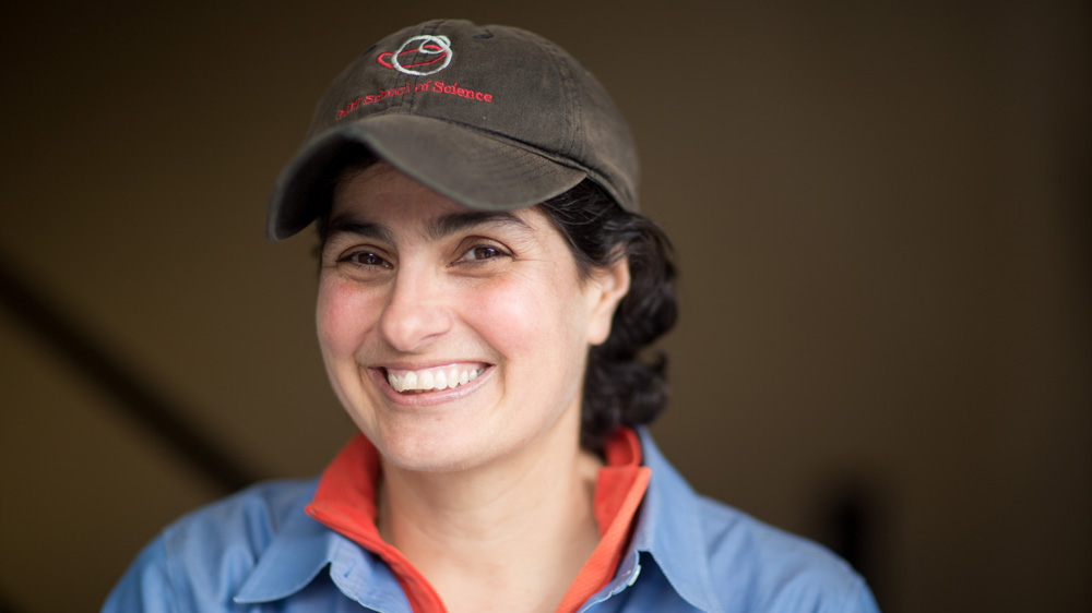 photograph of Nergis Mavalvala wearing MIT baseball cap