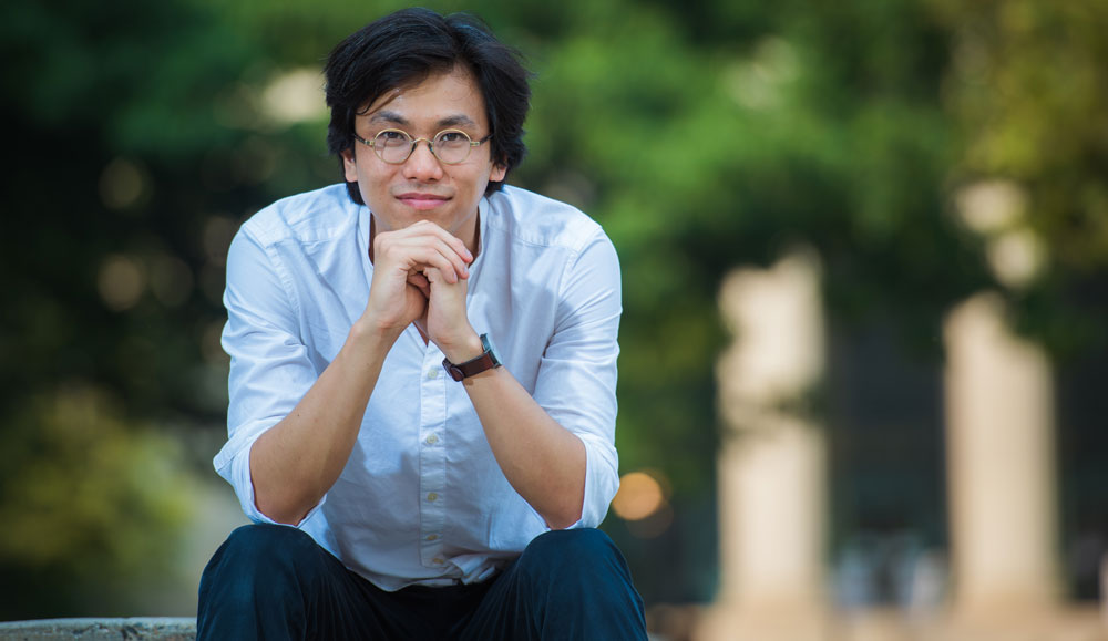 Portrait of Rodrigo Ochigame outside looking at camera