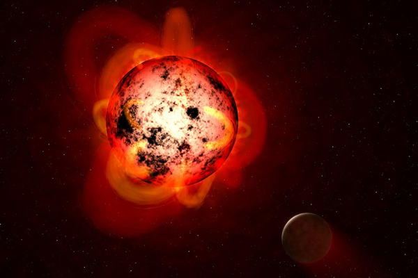 An illustration of a red dwarf star orbited by an exoplanet