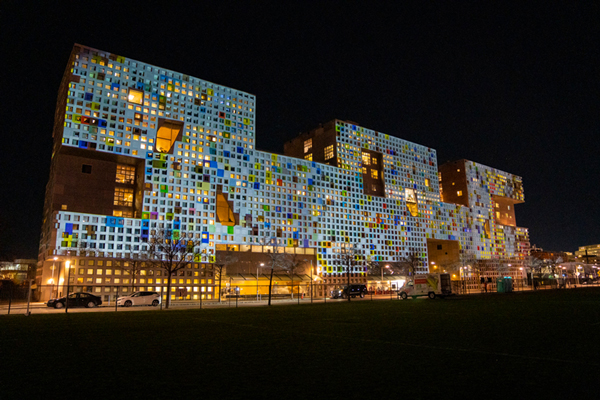 Simmonds Hall at MIT lit up at night