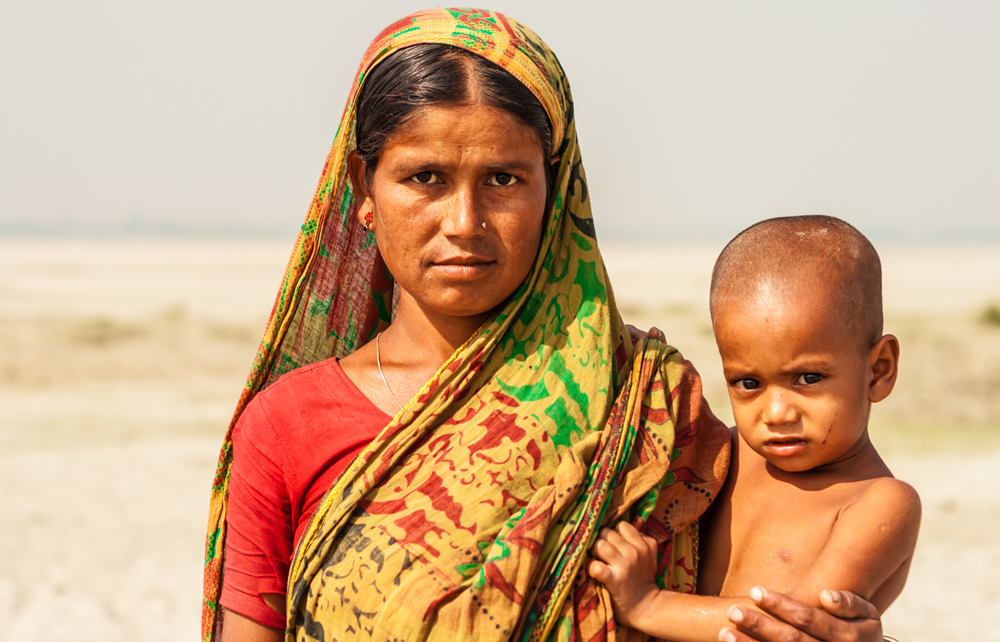 A Bangladeshi mother holding her young child