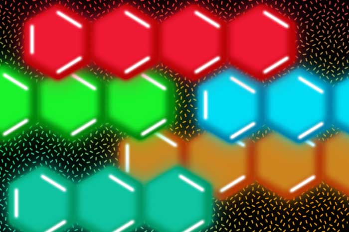 Graphic rendering of connected acenes, shaped as hexagons, in rows and colorized red, green, blue, orange, and teal upon background with sparkle-shaped pattern  