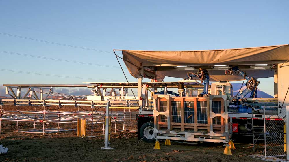 Solar panels being installed in rural land