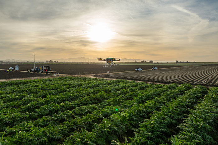 drone flying over farm