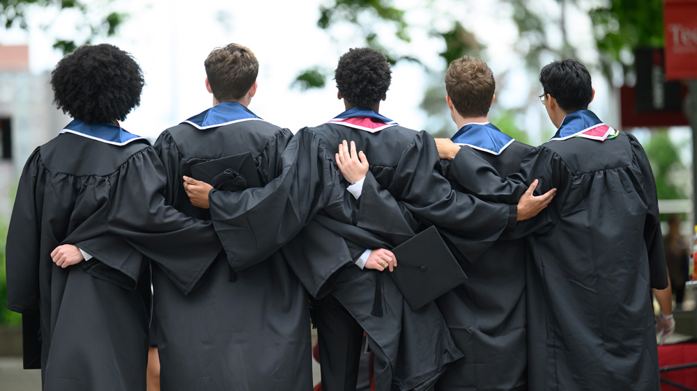 graduate group photo from behind
