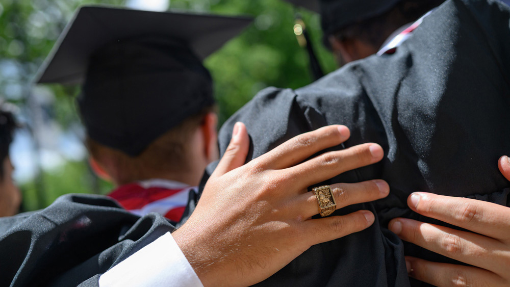 hand showing brass ring