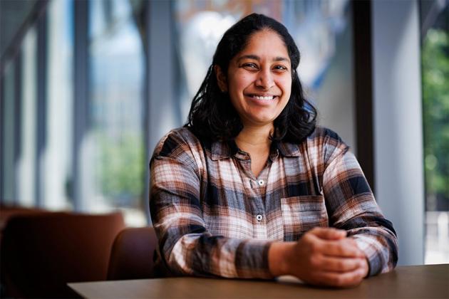 Priya Donti, an MIT electrical engineering and computer science professor, studies how machine learning can make the power grid more efficient and resilient.