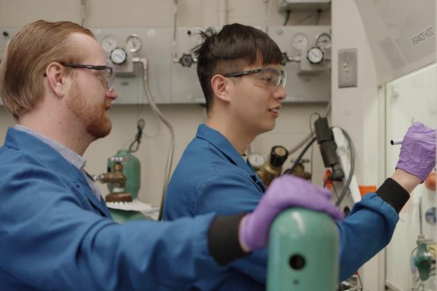 Glen Junor (left) and Fang-Yu Kuo work in the lab. 