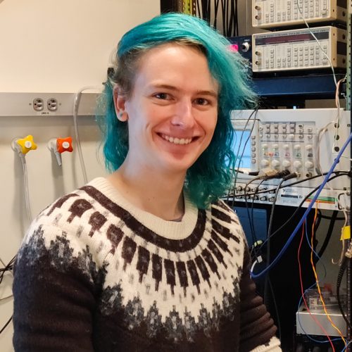 headshot of me in the lab